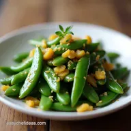 Caramelized Garlic Snap Peas with Sweet Lemon Zest