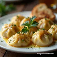 The Best Homemade Chicken Dumplings Recipe with Fluffy Biscuits