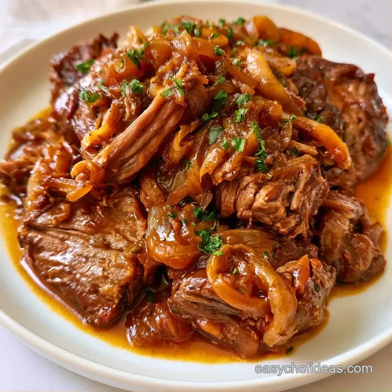 Slices of moist, browned beef arranged elegantly with a drizzle of glossy jus and a garnish of fresh thyme sprigs.